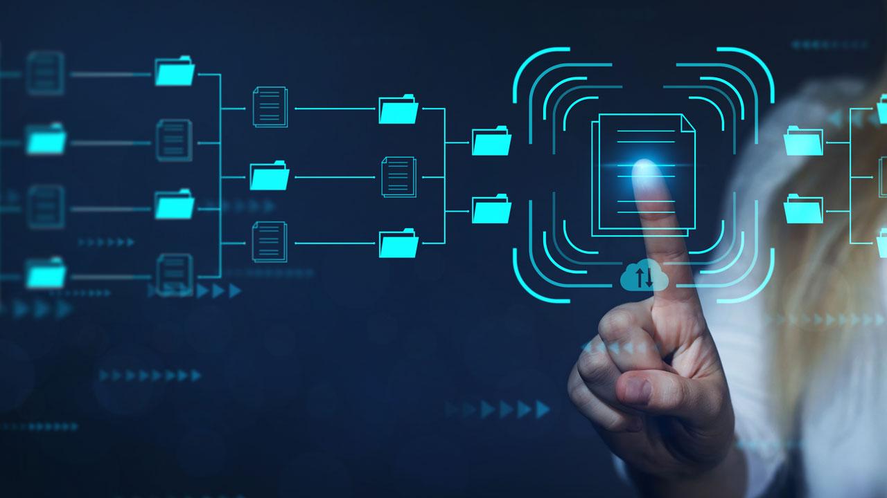 A person pushes their finger against a document in a green digital file structure chart against a deep blue background